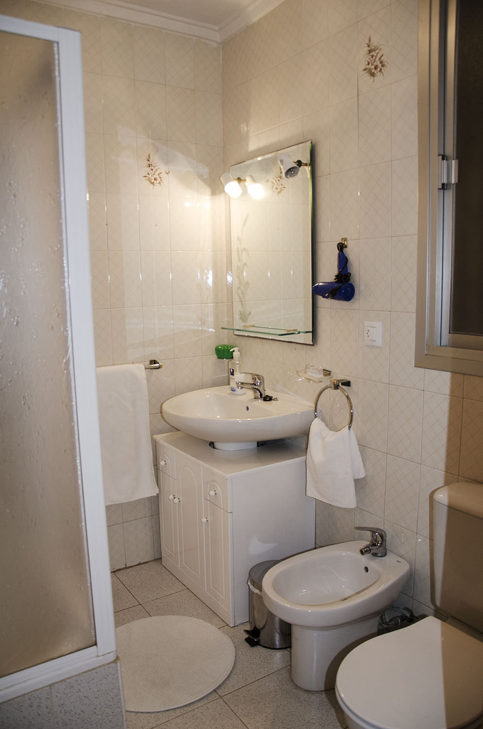 Bathroom with shower and bathtub.